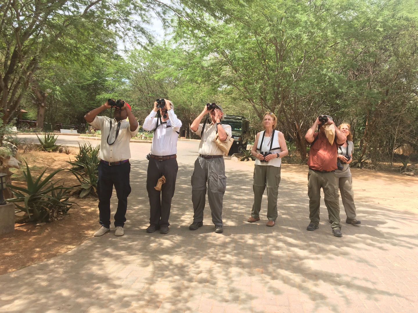 L-R: Driver Maxwell, Denis, Nicholas, Carolyn, Mitch and Sonny from USA at Aruba Camp, Tsavo East during a 21-day birding trip in February 2019 